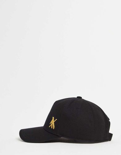 Cappello con visiera nero con logo oro - Armani Exchange - Modalova