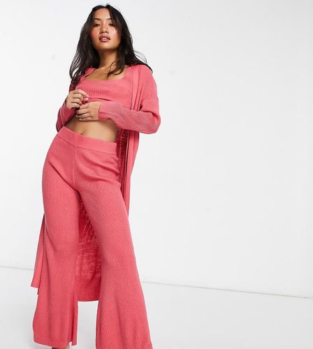 ASOS DESIGN Petite - Pantaloni da casa a zampa mix & match in maglia polvere - ASOS Petite - Modalova