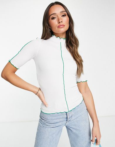 T-Shirt accollata attillata con profili smerlati - Envii - Modalova