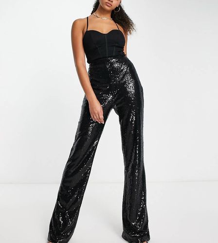 Esclusiva - Pantaloni a zampa neri in paillettes-Nero - In The Style Tall - Modalova