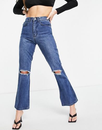 Jeans a zampa a vita alta medio con strappi al ginocchio - Femme Luxe - Modalova