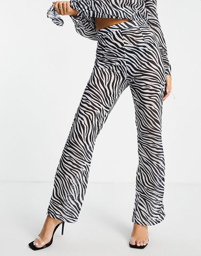 Pantaloni a fondo ampio in stampa zebrata in coordinato - Femme Luxe - Modalova