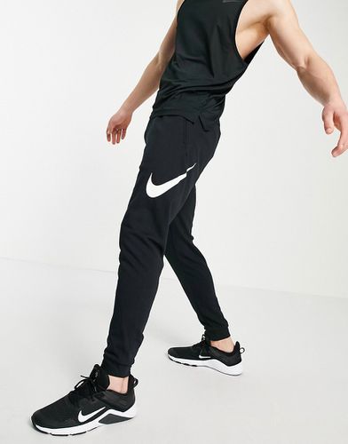 Joggers neri con logo-Nero - Nike Training - Modalova
