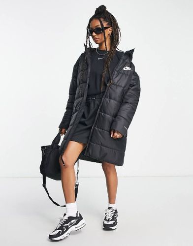 Giacca imbottita classica taglio lungo nera con cappuccio-Nero - Nike - Modalova
