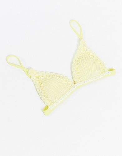Top bikini a triangolo preformato testurizzato giallo - River Island - Modalova